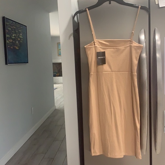 Small Bodycon mini dress. New with tags. Taupe - Picture 2 of 2